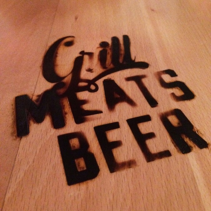 The logo burnt into the table top.